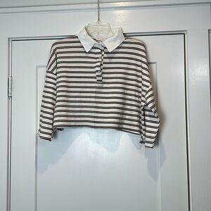 Don’t ask why brand crop top shirt. One size fits most.